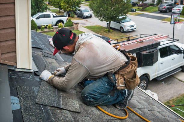 Professional Roofing technician working in Upland, CA
